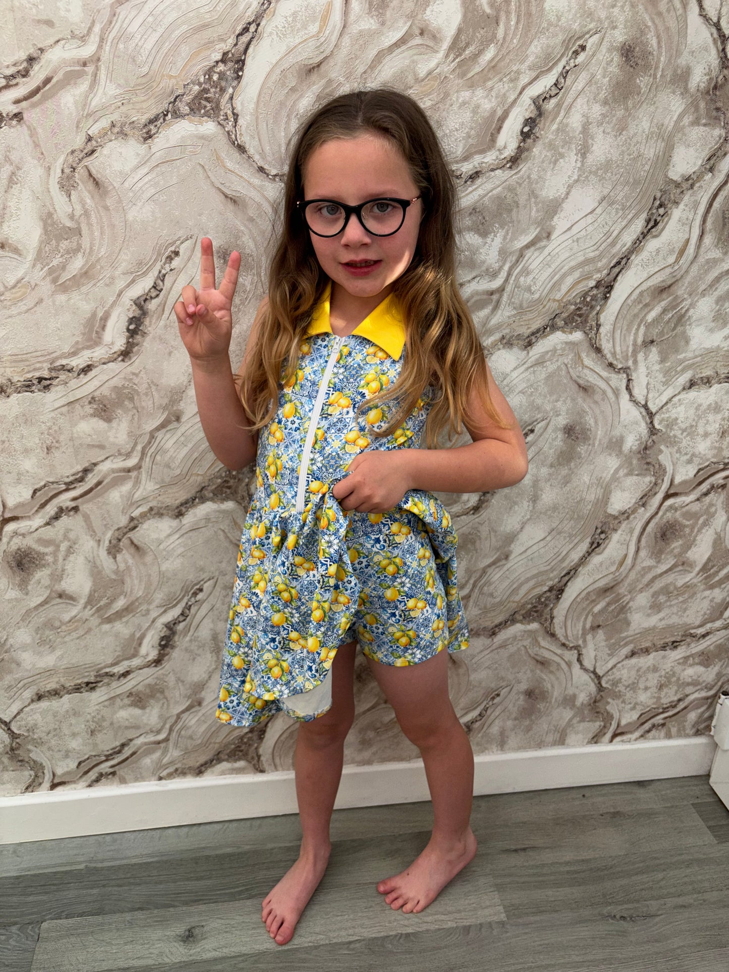 Girls lemon ‘Dolce Vita’ tennis dress with fitted shorts