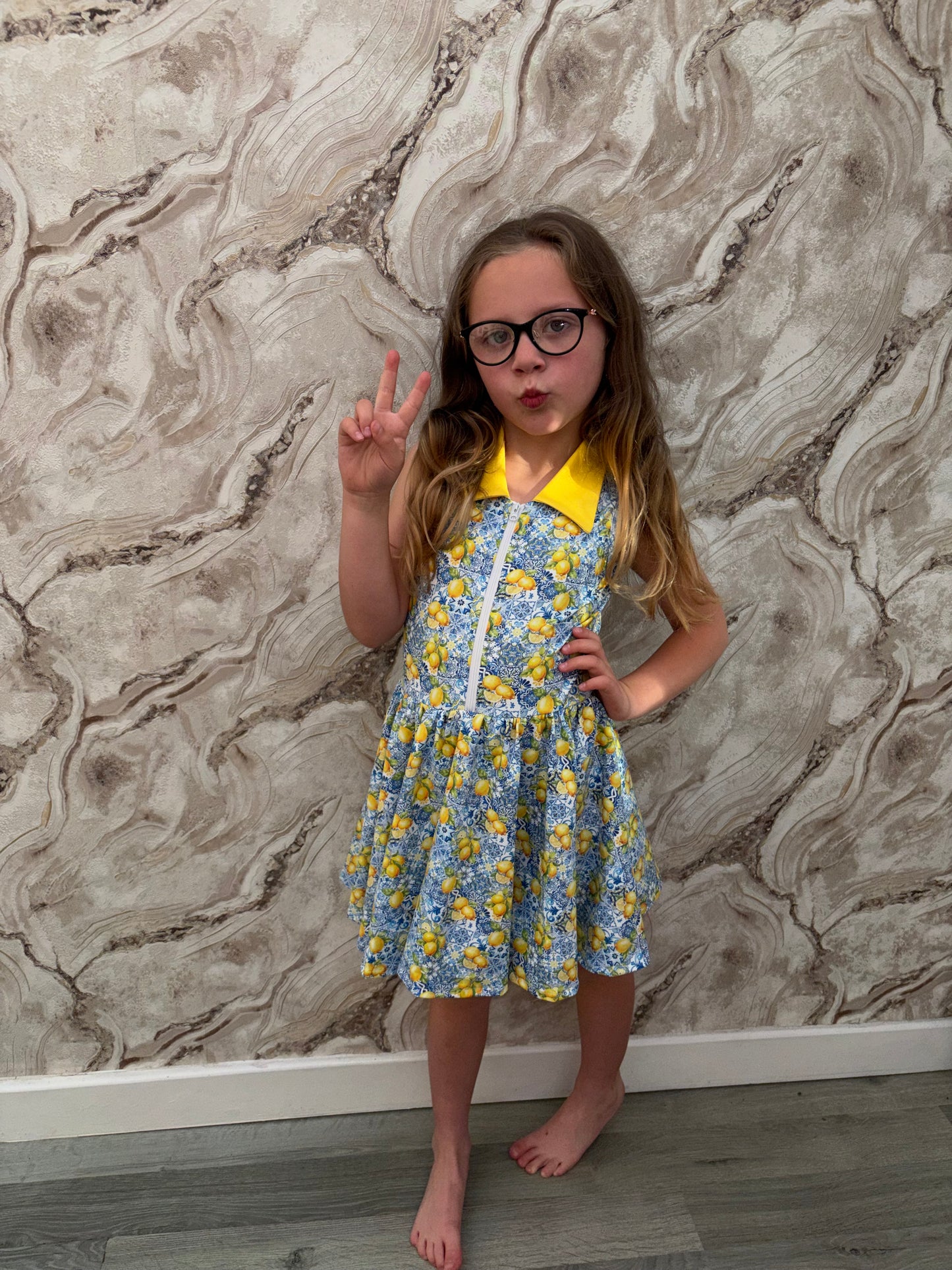 Girls lemon ‘Dolce Vita’ tennis dress with fitted shorts